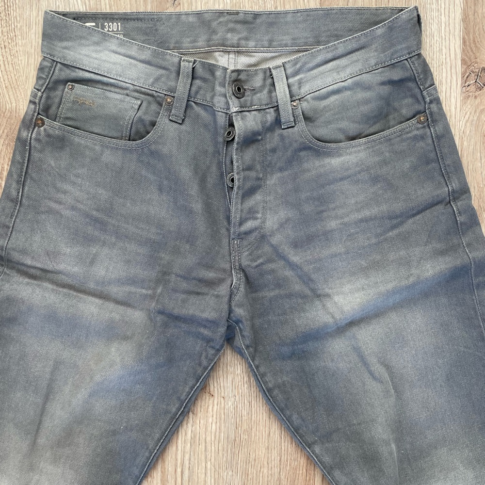 Grey G-Star jeans style 3301 tapered.